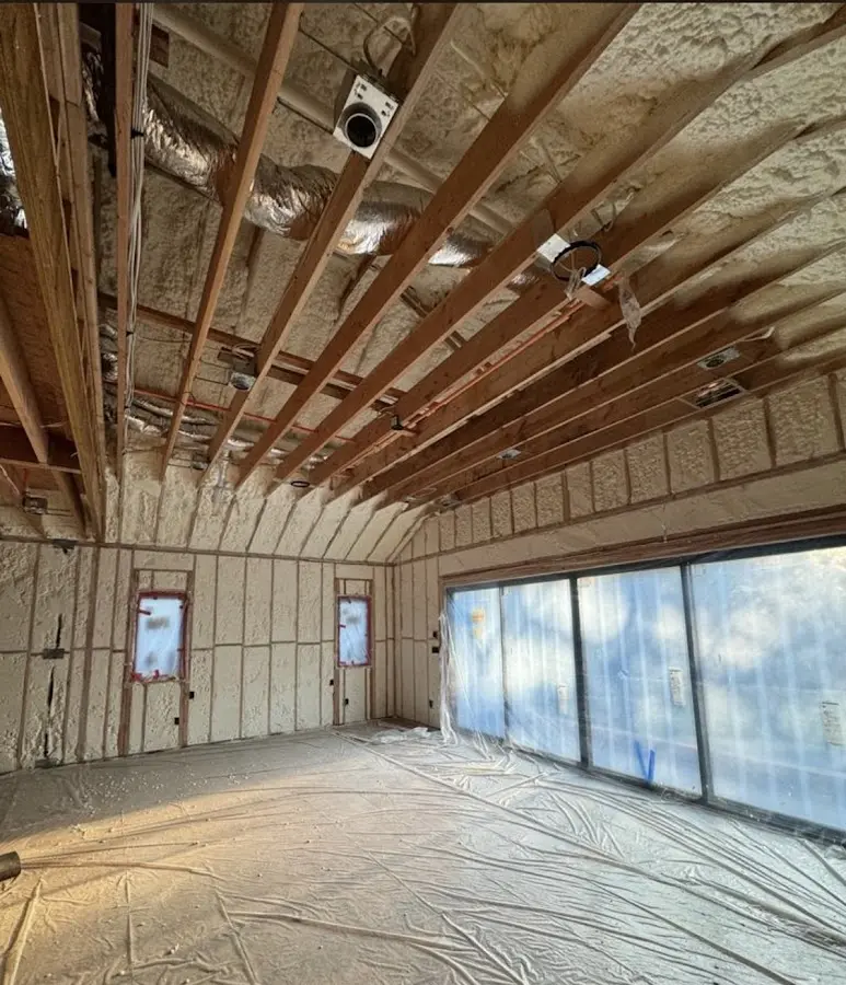 Interior walls and ceiling insulated with spray foam during new construction in Ensley